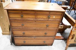 A Victorian Aesthetic style chest of two over three drawers