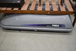 A Thule roofbox, model Alpine 100