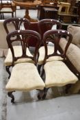 A set of four Victorian mahogany dining chairs