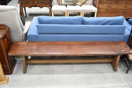 A traditional dark stained oak form bench , length approx. 205cm