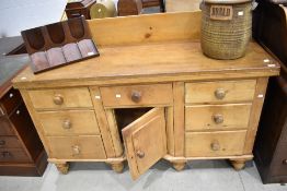 A 19th Century pine ledge back sideboard, width approx. 150cm