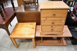 A modern pine square coffee table, approx. 53 x 53cm, a similar three drawer bedside chest and a