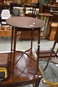 An Edwardian mahogany occasional table