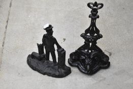 Two cast iron doorstops