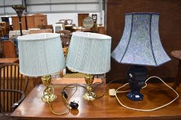 Three (pair plus one) modern table lamps