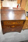 An Edwardian mahogany bureau having satinwood inlay decoration