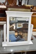 A reproduction painted dressing table mirror