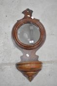 A 19th Century wall mirror sconce