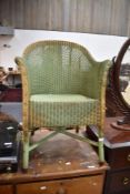 A vintage Lloyd Loom tub chair