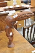 A treen tribal style figure
