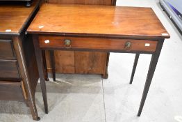 A 19th Century and later mahogany side table having lion mask handles to drawers