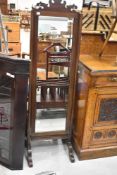 An early 20th Century mahogany framed cheval mirror
