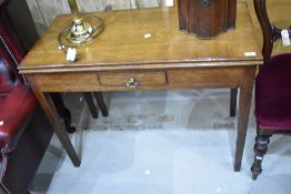 A 19th Century oak fold over tea table, having small drawer to frieze, width approx. 94cm
