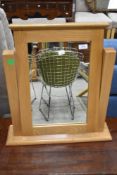 A modern oak dressing table mirror
