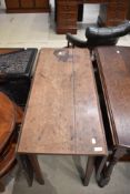 A 19th Century gateleg dining table, width approx. 104cm