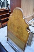 Two early 20th Century walnut single bedsteads (no irons or base)
