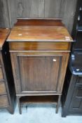 An Edwardian mahogany side cabinet