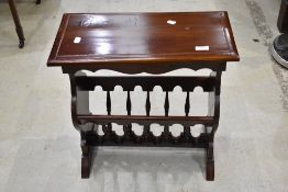 A modern hardwood magazine table