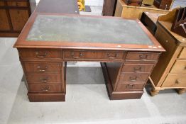 A reproduction Regency style pedestal desk