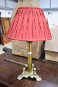 An Art Nouveau design brass table lamp