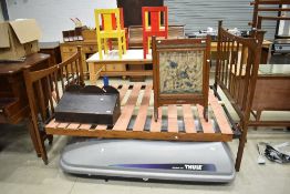 A early 20th Century oak bed frame having later slatted ply base, width approx. 140cm