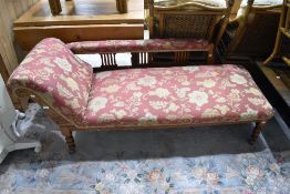 A Victorian oak frame chaise longue