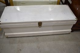 A stained frame bedding chest