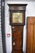 A late 18th Century stained softwood longcase clock having 8 day movement and brass dial, named