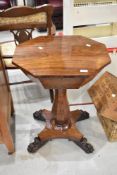 A 19th Century William IV design rosewood sewing table or teapoy having octagonal top, typical