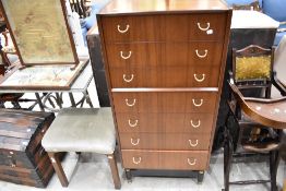 An mid Century G plan narrow chest and a dressing table stool