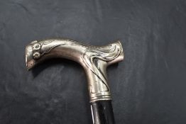 A German 800 grade white metal mounted walking stick, of Art Nouveau design , the handle marked '.