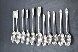 A set of six Victorian silver teaspoons of fiddle back form bearing monogram to terminals, London