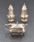 A silver three piece cruet set of plain form, Birmingham 1970, Deakin & Francis, with silver