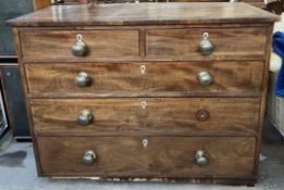 A Victorian mahogany chest with two short and three long drawers