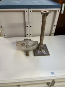 An electroplated candlestick of corinthian column with a square base and swags,
