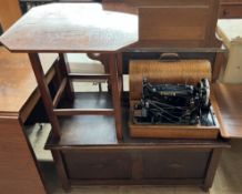 An oak coffer with a rectangular top above a two panel front on turned legs together with an