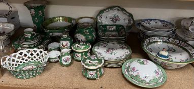 A Booths green scale and floral decorated part dinner set together with a similar ginger jar and