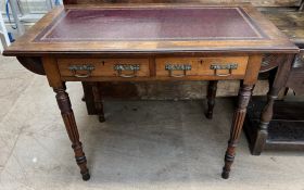 An Edwardian walnut desk,