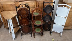 An oak occasional table with a triangular top,