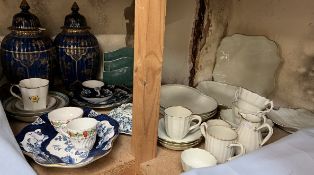 A pair of Booths pottery vases and covers together with Booths scale willow pattern dishes,