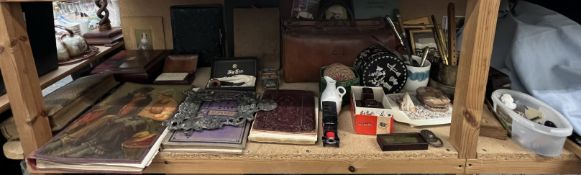 Scrap albums together with photograph albums, playing cards, leather doctors bag, pipe,