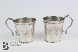 Near Pair of White Metal Tankards