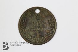 Circular Metal Hamburg-Amerika Shipping Luggage Tally Disc