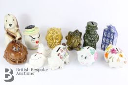 Thirteen Large Ceramic Moneyboxes