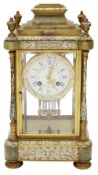 A late 19th century French champleve enamel and brass cased mantle clock