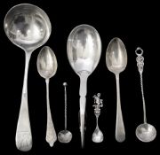 A Georg Jensen silver sugar spoon, a George III Old English pattern sauce ladle and other spoons