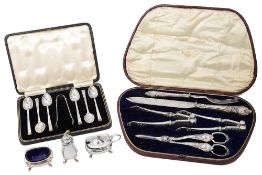 A cased set of six Art Deco silver coffee spoons with sugar tongs and others