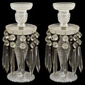 A pair Victorian cut glass lustre candlesticks