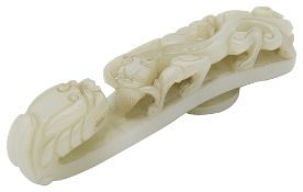An early 20th century Chinese jade belt hook