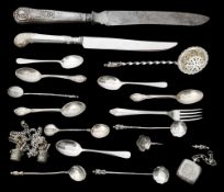 A selection of silver coffee spoons and other items